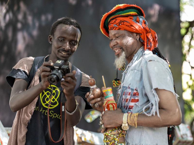 Two participants with a camera